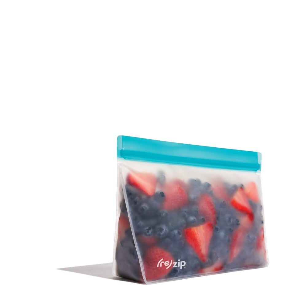 tand-up quart-size reusable food storage bag filled with fresh mixed berries – airtight, leakproof, freezer-safe, perfect for meal prep, snacks, and sustainable kitchen storage