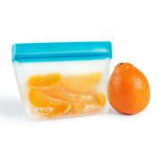 1-cup reusable stand-up snack bag holds a full peeled orange – eco-friendly food storage for fruit, snacks, and healthy lunches