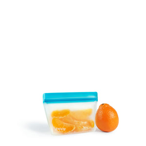 1-cup reusable stand-up snack bag holds a full peeled orange – eco-friendly food storage for fruit, snacks, and healthy lunches