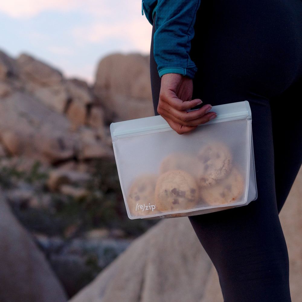 tand-up quart-size reusable food storage bag filled with fresh mixed berries – airtight, leakproof, freezer-safe, perfect for meal prep, snacks, and sustainable kitchen storage