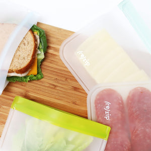 Reusable half gallon deli food storage bags are a refrigerator must-have. Durable, food-grade PEVA bags perfect for school and work lunches.